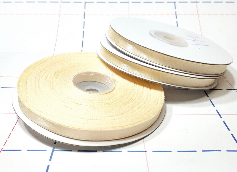 006 Лента атласная 6 мм 27м/боб (+-1м) оттенок кремового