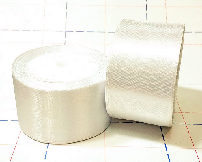 009 Лента атласная 50мм 23м (+-1м) оттенок молочного