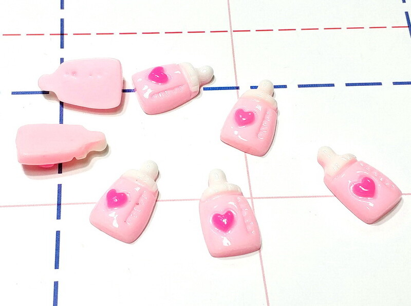 219 Кабошон Бутылочка 22 мм розовый