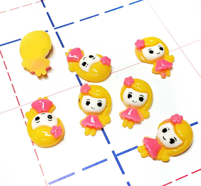 302 Кабошон Девочка 25 мм желтый