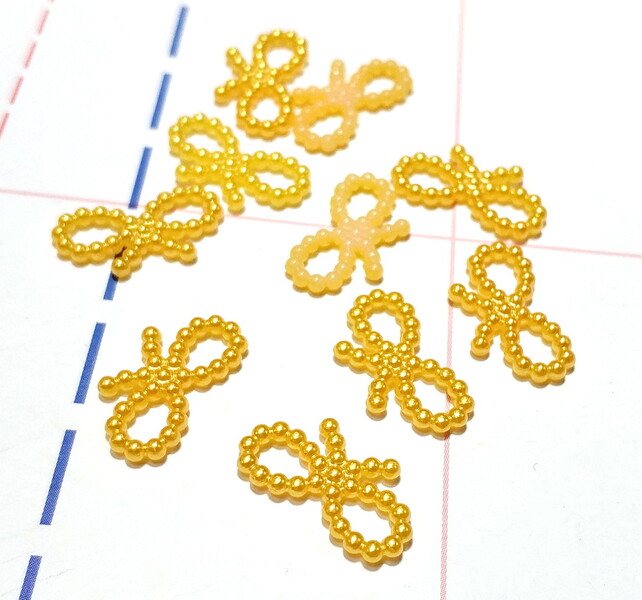 453 Кабошон Бантик 18*10 мм 10шт/уп оранжевый