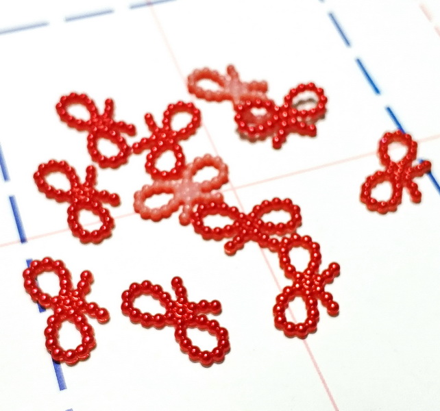 457 Кабошон Бантик 18*10 мм 10шт/уп красный