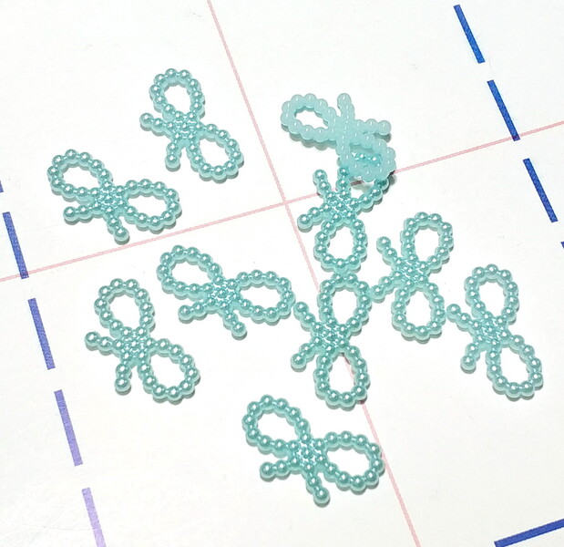 459 Кабошон Бантик 18*10 мм 10шт/уп голубой