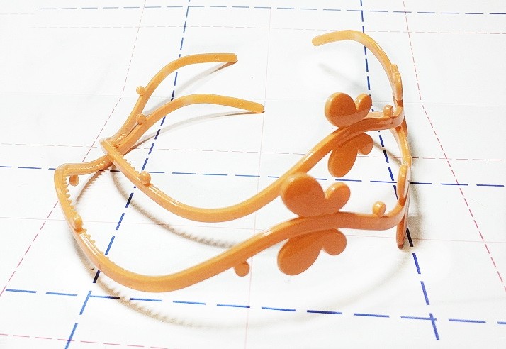 04 Ободок для волос пластик Бабочки 5 мм оранжевый